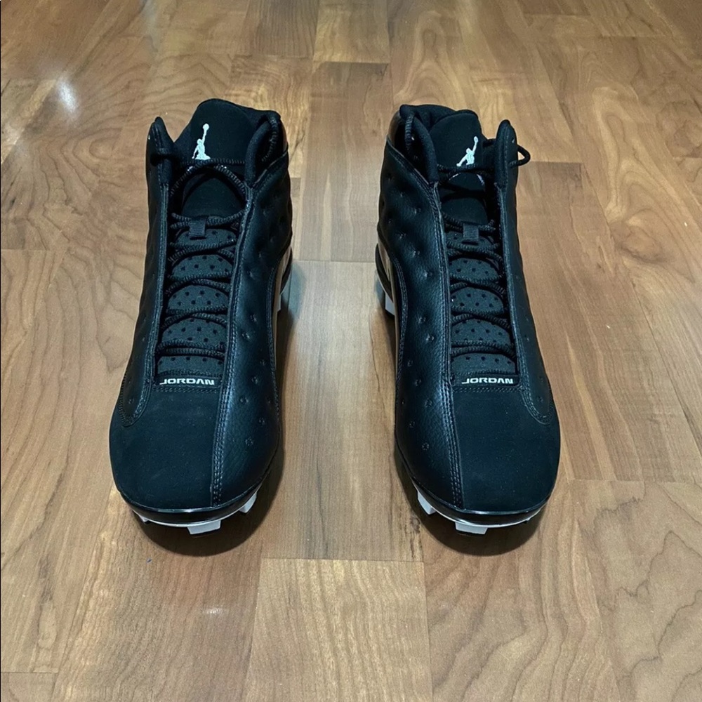 Black and white Jordan 13’s size 13 Sports Cleats
